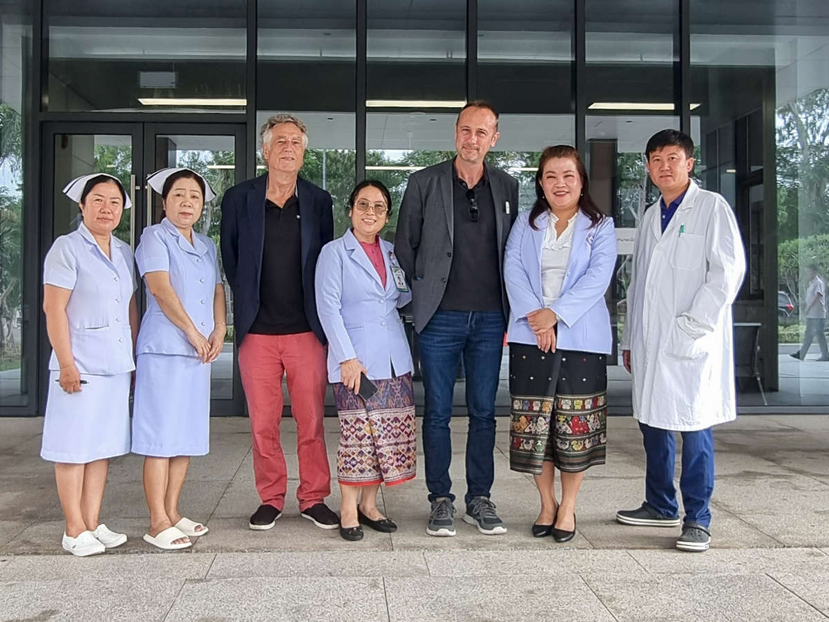 Group photo of people in hospital staff clothing